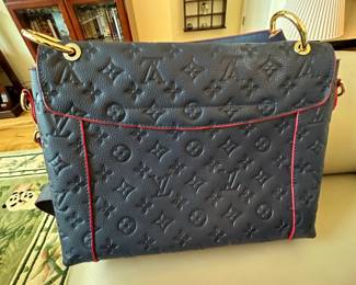 LOUIS VUITTON BLUE AND RED PURSE USED GOOD