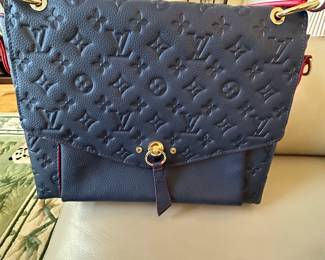LOUIS VUITTON BLUE AND RED PURSE USED GOOD