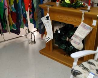 Faux fireplace with base, garden and yard flags.