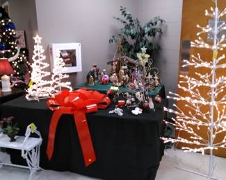 Outdoor lighted trees, great red ribbon for that special gift! (Nativity Display not for sale)