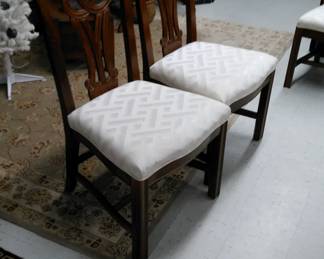 Set of 4 (only and a part of a third pictured) dining side chairs.