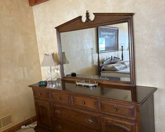 Vintage Ethan Allen Classic Heritage Manor Collection  
Solid nutmeg maple
Jewelry drawer
Pullout dressers
Original Brass hardware
Dresser 72x21x33
Mirror 52 x 42