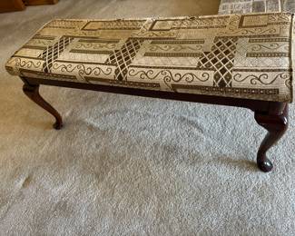 44x17x18 
Solid wood footed fabric covered and padded bench
Nutmeg maple stain
