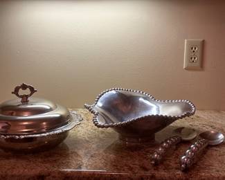 Mariposa  Brillante Polished Aluminum Wave
Beaded Pearl Serving Bowl Mexico 1997

Pair of Mariposa Serving Utensils
Polished aluminum Mexico 1997

Arcuisine Le France Covered serving dish with glass insert 