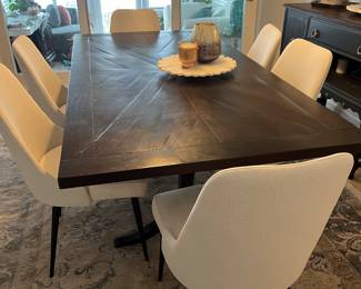 The dining table and chairs are at Kellie’s store located at 5000 Marsh Road, Okemos, MI 48864 Picture 1 of 2