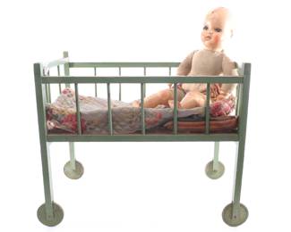 composition doll and bed