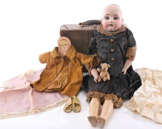 Antique bisque doll, clothing, and case
