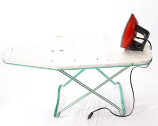 Child's tin ironing board and iron