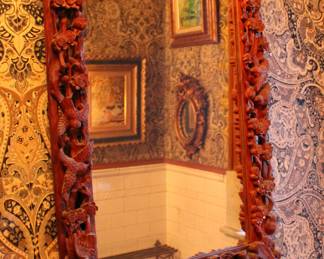 Carved wood mirror with birds and foliage