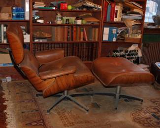 Vintage Eames style lounge chair and ottoman, as shown condition