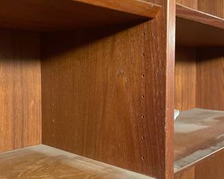 Detail on the mid century teak double bookcase with adjustable shelves