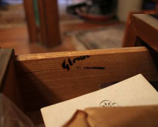 Mark inside drawer on the Glen of California stand with tamboured doors in the top, drawers in the bottom