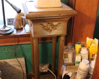 Gold gilt stand with marble top