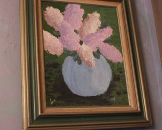 Still life of lilacs in a vase, signed