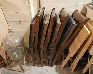 Wood folding chairs, vintage glass wat bottle
