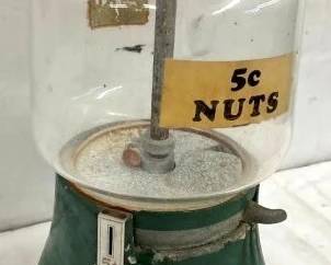 CLOSE UP VIEW NUT COIN OP MACHINE