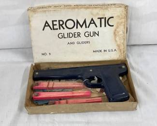 NOS AEROMATIC GLIDER GUN