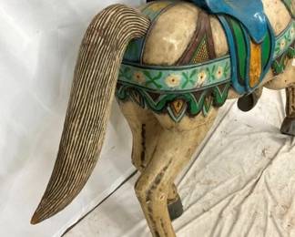 CLOSEUP VIEW CARVED TAIL