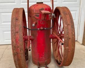 OTHERSIDE VIEW LARGE FIRE EXTINGUISHER 