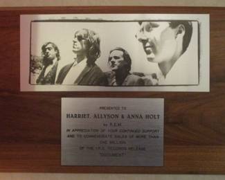 REM plaque presented to family