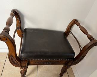 Contains a chess set under the cushion