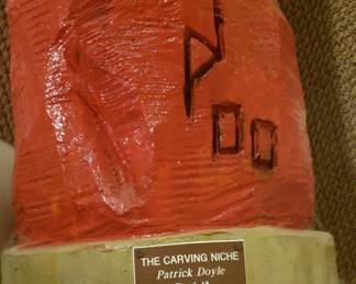 Signature on Santa wood carving