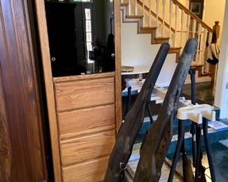 Cool oak unit with drawers, smoky glass front storage and mirrored back.