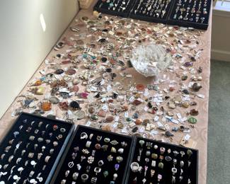 SO MUCH STERLING! Ladies’ rings with various stones, pendants and charms.