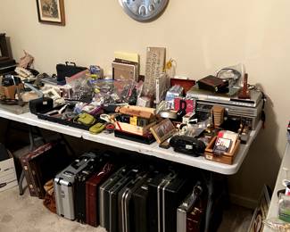 Gun cases, jewelry cases, brief cases, office supplies and misc. items.