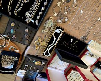 Some watches, James Avery bracelets and charms, Pandora bracelets and charms.