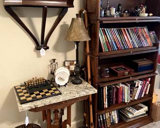 Marble top table, chess sets, gun & knife books and catalogs.