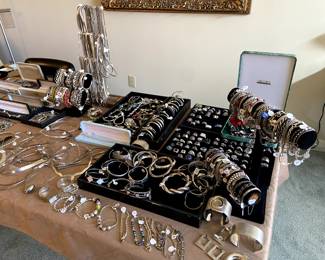 Bracelets, bangles, rings, chains, collar necklaces.