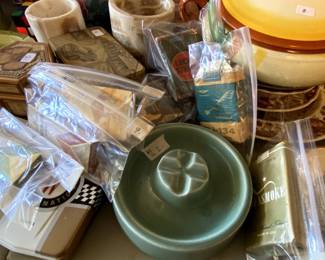 Vintage cigarettes and ashtrays.