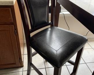 wood and leather chairs