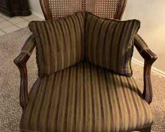 wicker back arm chair, custom upholstery and pillows