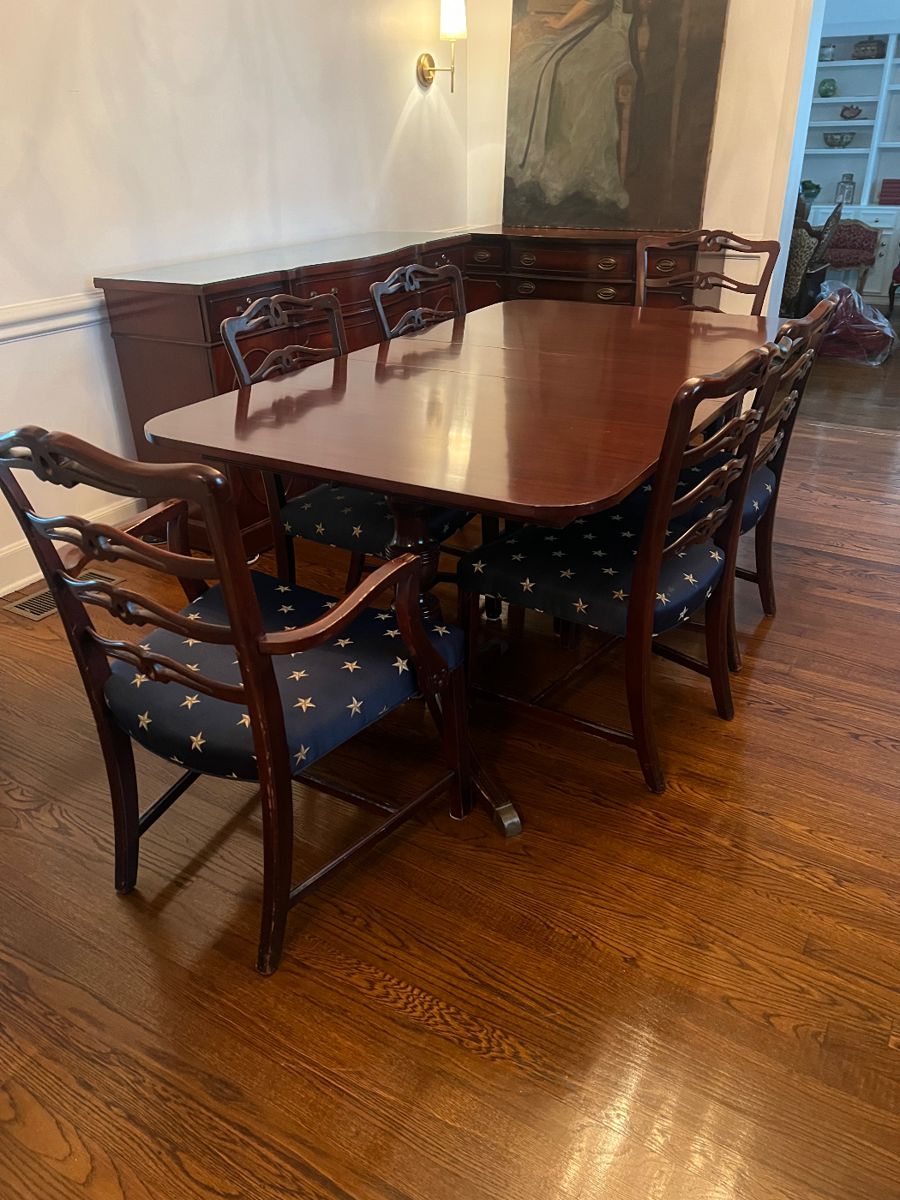 Dining Room Table with 6 chairs.  3 leaves and custom cover pad included. 