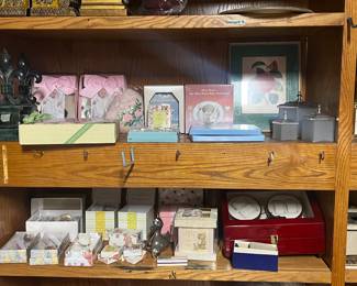 tons of new, unopened baby gifts and decor