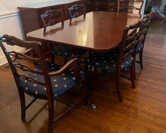 Dining Room Table with 6 chairs.  3 leaves and custom cover pad included. 