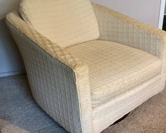 Listed here is a small round swivel chair upholstered in a cream fabric. Because this chair has some wear, we have priced it at only $35. 
It’s actually very comfortable, and it would be a great reupholstery project!