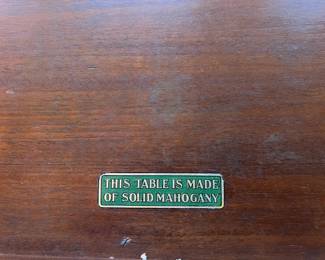 This is the plaque stating it is solid mahogany.  No plywood or chipboard here.