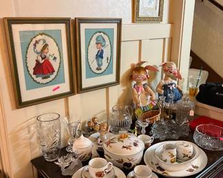 Here is a look at some of the dishware, framed art, and dolls.