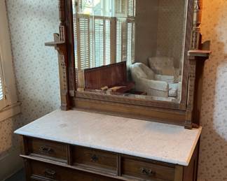 This is another mirrored dresser, with a pretty big mirror and large top.