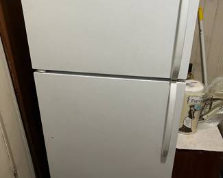 This is a top-freezer Frigidaire model refrigerator.