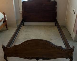 This bedframe is available for sale.  Come find out if it is a twin or full size.
