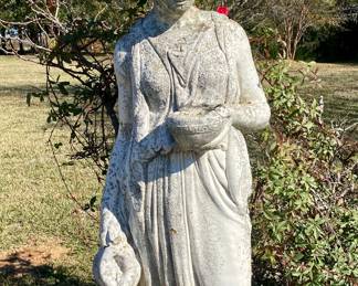 Large, almost life size concrete statue 