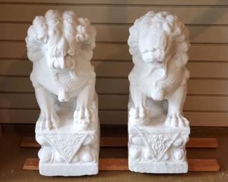Pair of hand-carved Chinese foo dogs from solid marble
