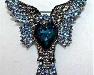Lot 081   11 Bid(s)
Blue rhinestone brooch pin
