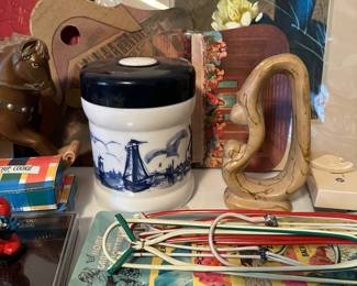Milk glass humidor and folding hangers.