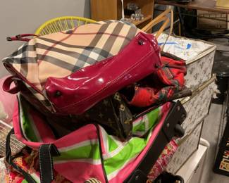 Collection of vintage purses. There is scout, coach and more 