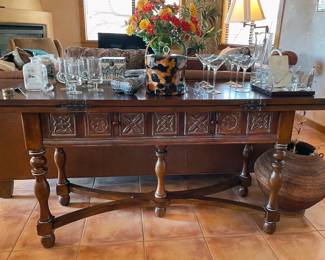 Carved wood sofa table with fold-out wings